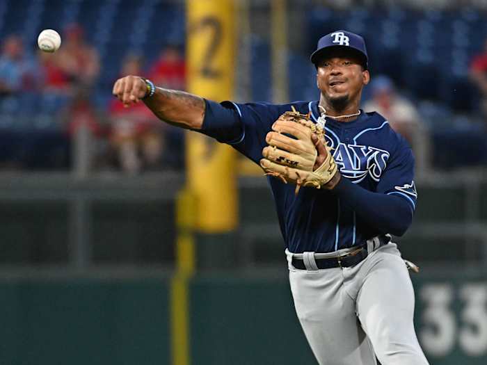 Tampa Bay Rays shortstop Wander Franco (5) throws to first base against the Philadelphia Phillies during the second inning at Citizens Bank Park.